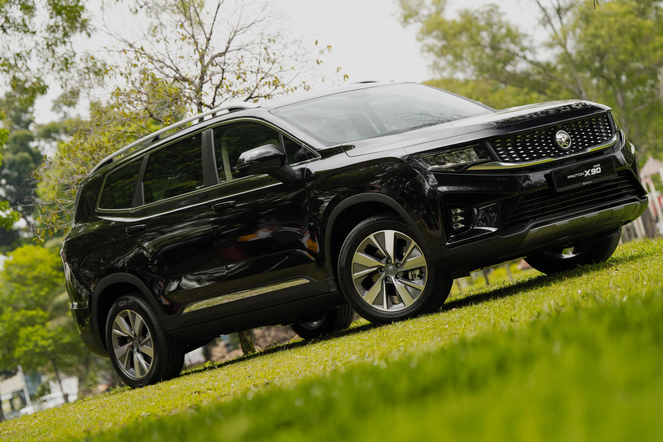 Black Proton X90 in an outdoor setting
